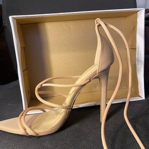 Stiletto neutral coloured laced heels